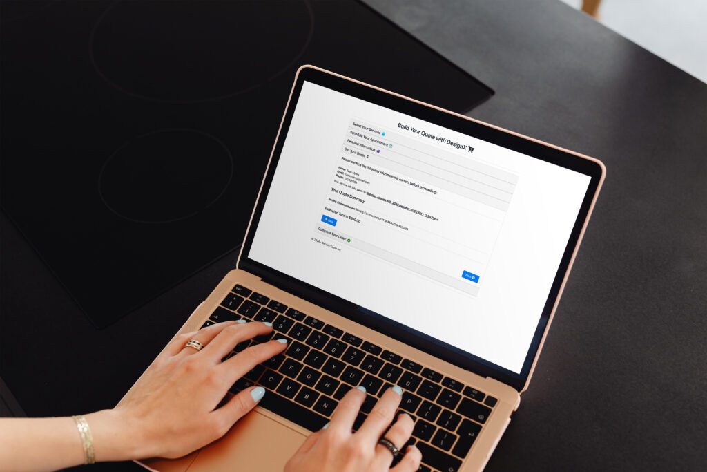 Laptop screen shows online quote form.