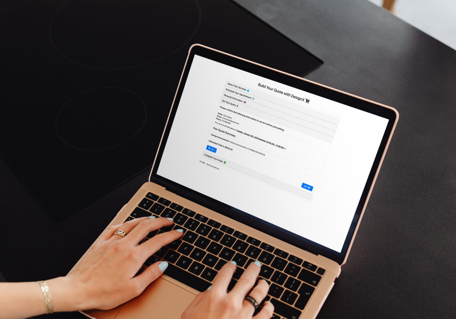 Laptop screen shows online quote form.